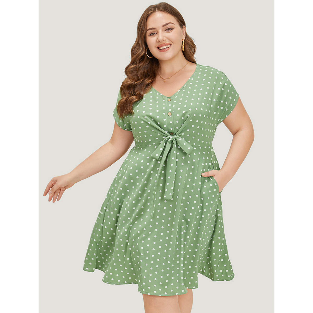 

Plus Size Polka Dot Pocket Button Detail Twist Front Knee Dress Green Women Knotted V-neck Cap Sleeve Curvy Knee Dress BloomChic