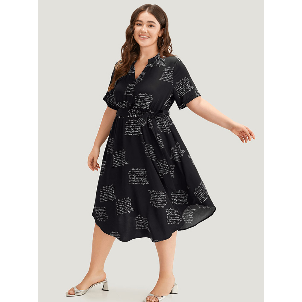 

Plus Size Letter Print Notched Belted Arc Hem Dress Black Women Belted Mock Neck Short sleeve Curvy Midi Dress BloomChic