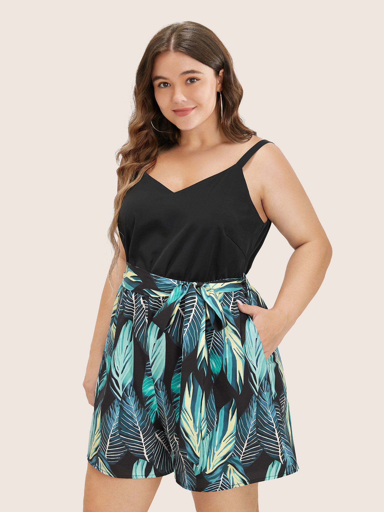 

Plus Size Black Tropical Patchwork Pocket Belted Cami Romper Women Resort Sleeveless V-neck Vacation Loose Jumpsuits BloomChic