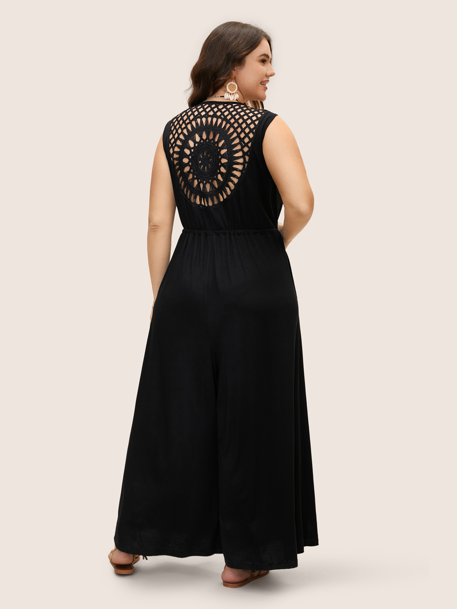 

Plus Size Black V Neck Crocheted Cut Out Jumpsuit Women Resort Sleeveless V-neck Vacation Loose Jumpsuits BloomChic