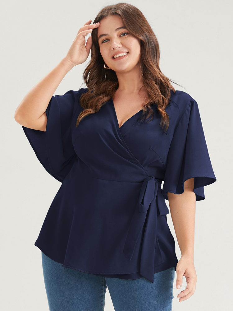 

Plus Size Indigo Plain Ruffles Button Belted Wrap Babydoll Blouse Women Elegant Short sleeve V-neck Dailywear Blouses BloomChic