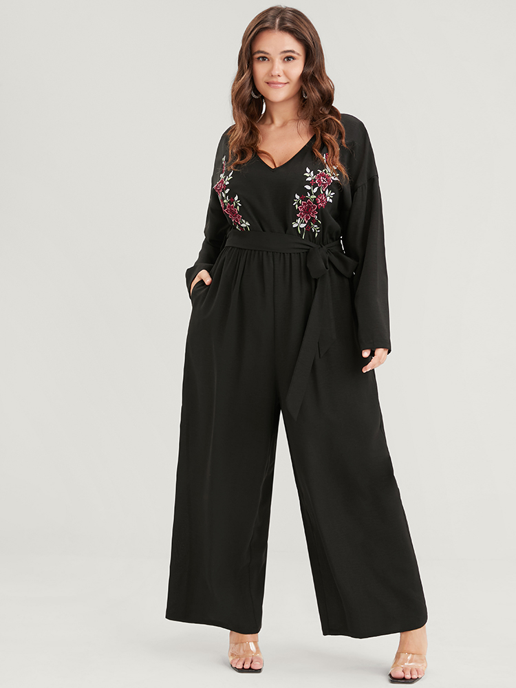 

Plus Size Black Solid Embroidered Pocket Belted Jumpsuit Women Elegant Long Sleeve V-neck Dailywear Loose Jumpsuits BloomChic