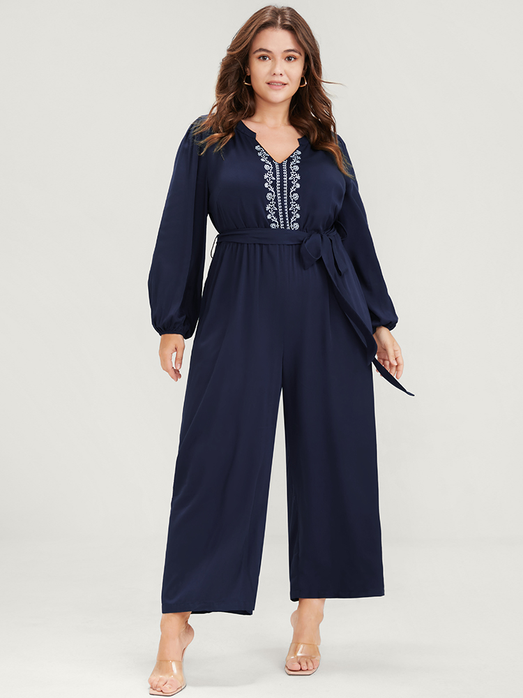 

Plus Size DarkBlue Solid V Neck Lantern Sleeve Embroidered Pocket Ties Jumpsuit Women Elegant Long Sleeve V-neck Dailywear Loose Jumpsuits BloomChic