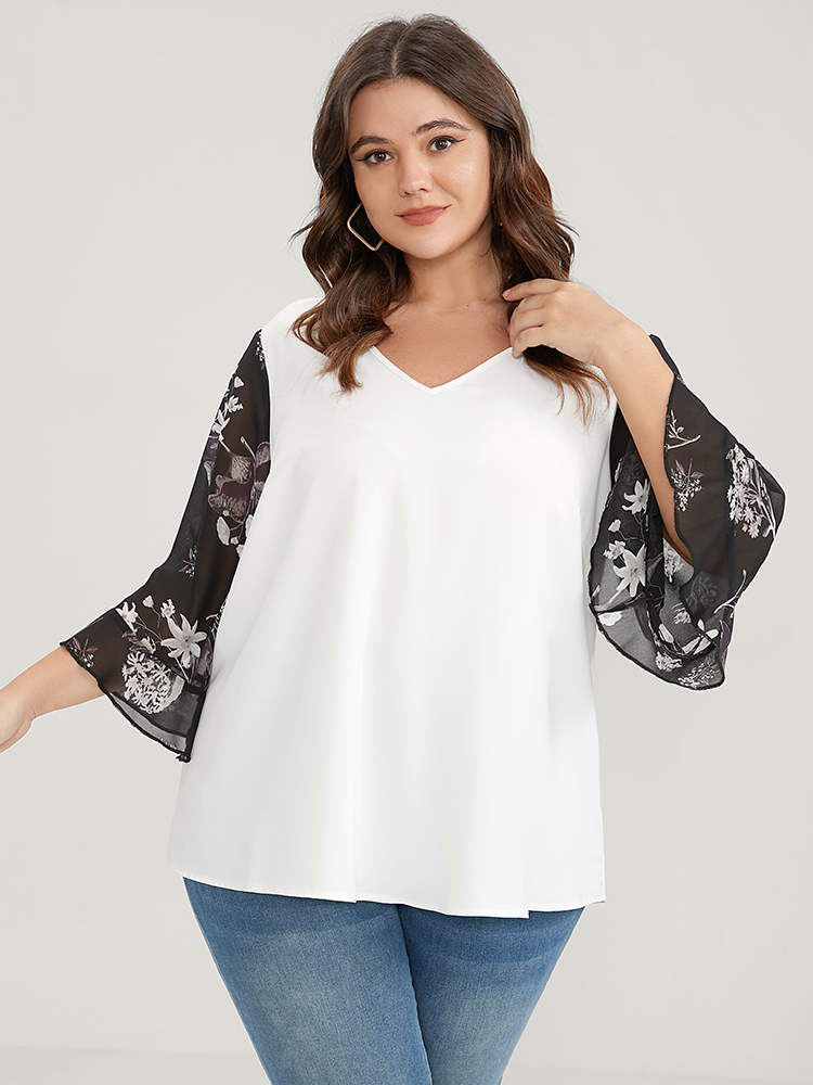 

Plus Size White Solid Patchwork Floral Flounce Sleeve V Neck Blouse Women Elegant Elbow-length sleeve V-neck Dailywear Blouses BloomChic