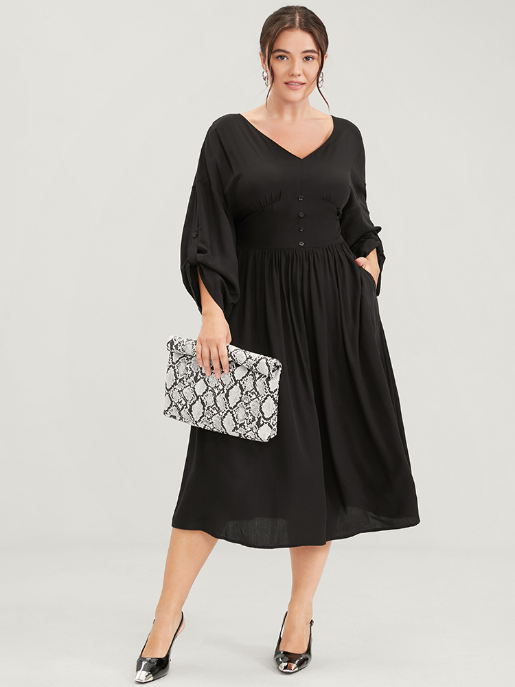 

Plus Size Plain Pocket Fake Button Cuffed Sleeve Flutter Hem Midi Dress Black Women Elastic Waist V-neck Long Sleeve Curvy Midi Dress BloomChic