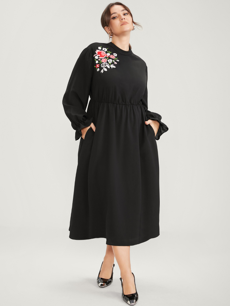 

Plus Size Floral Embroidered Pocket Mock Neck Dress Black Women Office Embroidered Mock Neck Long Sleeve Curvy Midi Dress BloomChic