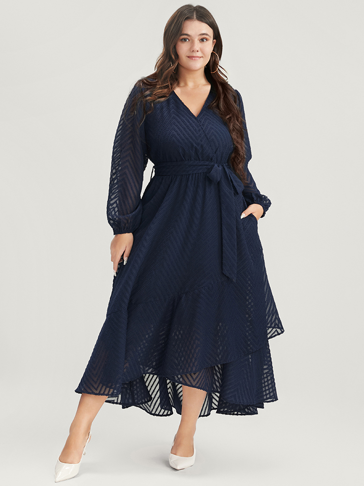 

Plus Size Solid Geometric Wrap Pocket Belted Asymmetrical Hem Dress DarkBlue Women Glamour Plain V-neck Long Sleeve Curvy Long Dress BloomChic