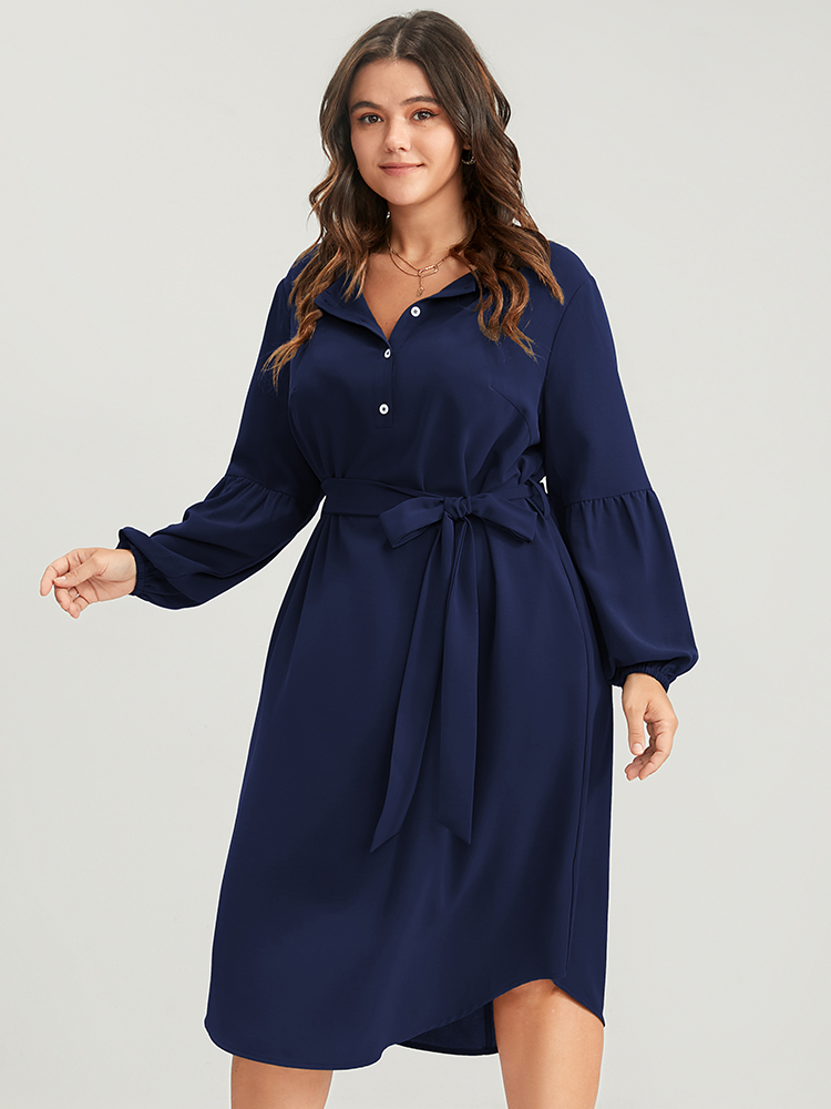 

Plus Size Solid Lantern Sleeve Button Pocket Belted Arc Hem Dress Navy Women Office Belted Round Neck Long Sleeve Curvy Midi Dress BloomChic