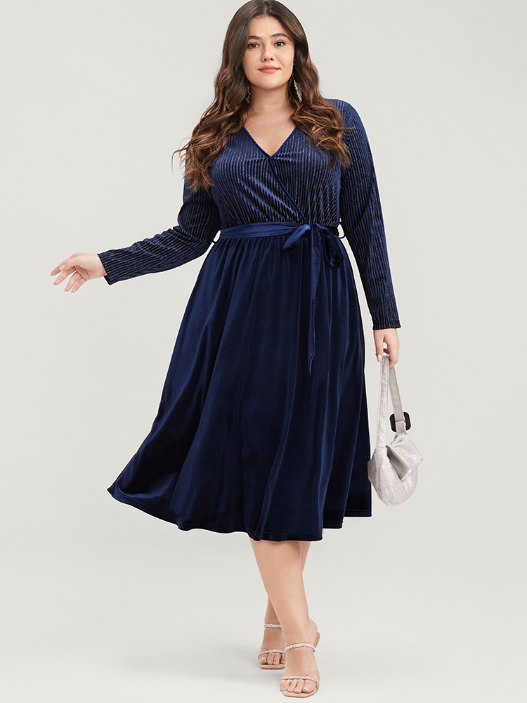 

Plus Size Glitter Striped Patchwork Surplice Neck Pocket Belted Velvet Dress Indigo Women Party Belted V-neck Long Sleeve Curvy Midi Dress BloomChic