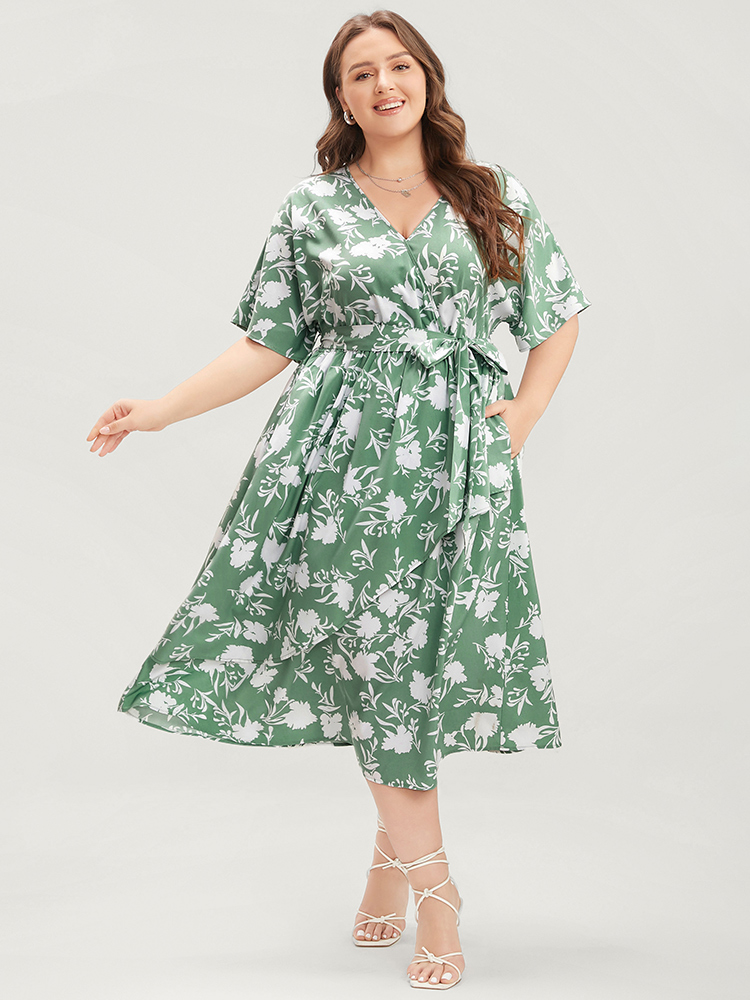 

Plus Size Floral Dolman Sleeve Pocket Belted Wrap Asymmetrical Flutter Dress Mint Women Elegant Belted V-neck Half Sleeve Curvy Midi Dress BloomChic