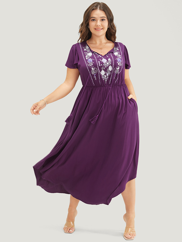 

Plus Size Floral Tie Neck Tassels Pocket Ruffle Arc Hem Dress Purple Women Elegant Gathered Tie Neck Short sleeve Curvy Long Dress BloomChic