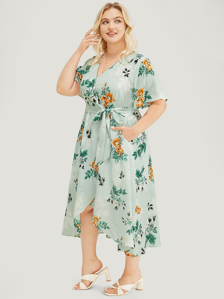 

Plus Size Floral Pocket Ruffle Sleeve Wrap Belt Asymmetrical Hem Dress LightGreen Women Elegant Cross straps V-neck Short sleeve Curvy Midi Dress BloomChic