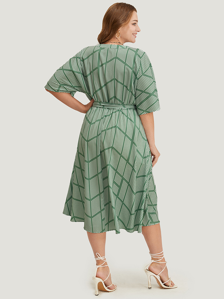 

Plus Size Geometric Print Dolman Sleeve Pocket Belted Ruffles Dress Mint Women Office Cross straps V-neck Short sleeve Curvy Midi Dress BloomChic