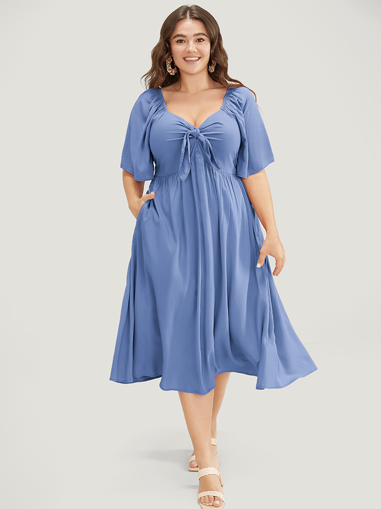 

Plus Size Solid V Neck Ruched Knotted Pocket Ruffle Hem Dress Cerulean Women Elegant Ruched V-neck Short sleeve Curvy Midi Dress BloomChic