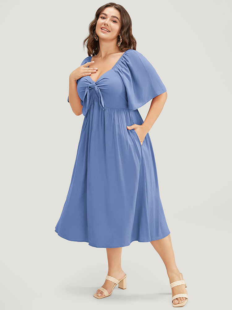 

Plus Size Solid V Neck Ruched Knotted Pocket Ruffle Hem Dress Cerulean Women Elegant Ruched V-neck Short sleeve Curvy Midi Dress BloomChic