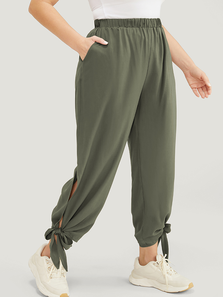 

Plus Size Solid Knotted Split Hem Pocket Pants Women Sage Casual Loose High Rise Dailywear Pants BloomChic