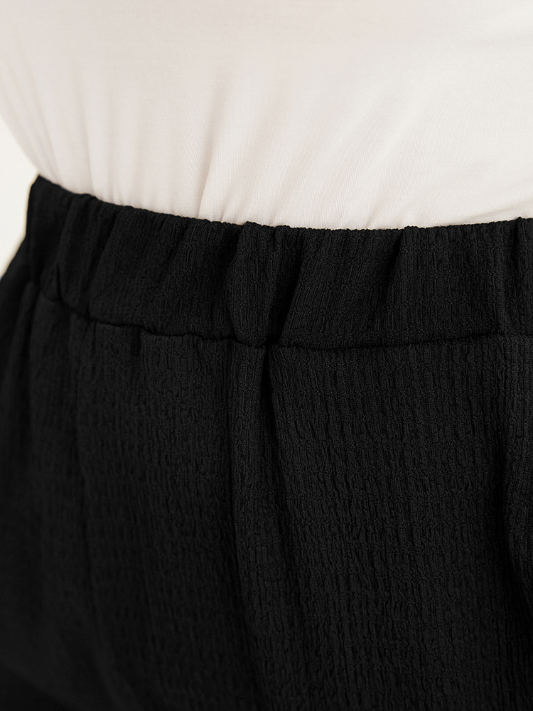 

Plus Size Solid Textured Elastic Waist Pocket Bootcut Pants Women Black Casual Mid Rise Dailywear Pants BloomChic