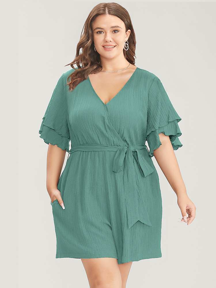 

Plus Size Emerald Plain Surplice Neck Ruffle Sleeve Pocket Belted Romper Women Elegant Short sleeve V-neck Dailywear Loose Jumpsuits BloomChic