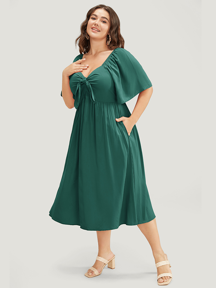 

Plus Size Solid V Neck Ruched Knotted Pocket Ruffle Hem Dress DarkGreen Women Elegant Ruched V-neck Short sleeve Curvy Midi Dress BloomChic