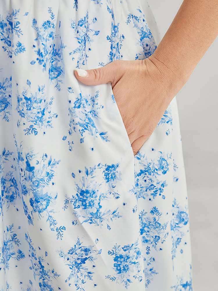 

Plus Size Floral Ruffle Trim Button Detail Pocket Shirred Waist Dress Blue Women Lined V-neck Short sleeve Curvy Midi Dress BloomChic