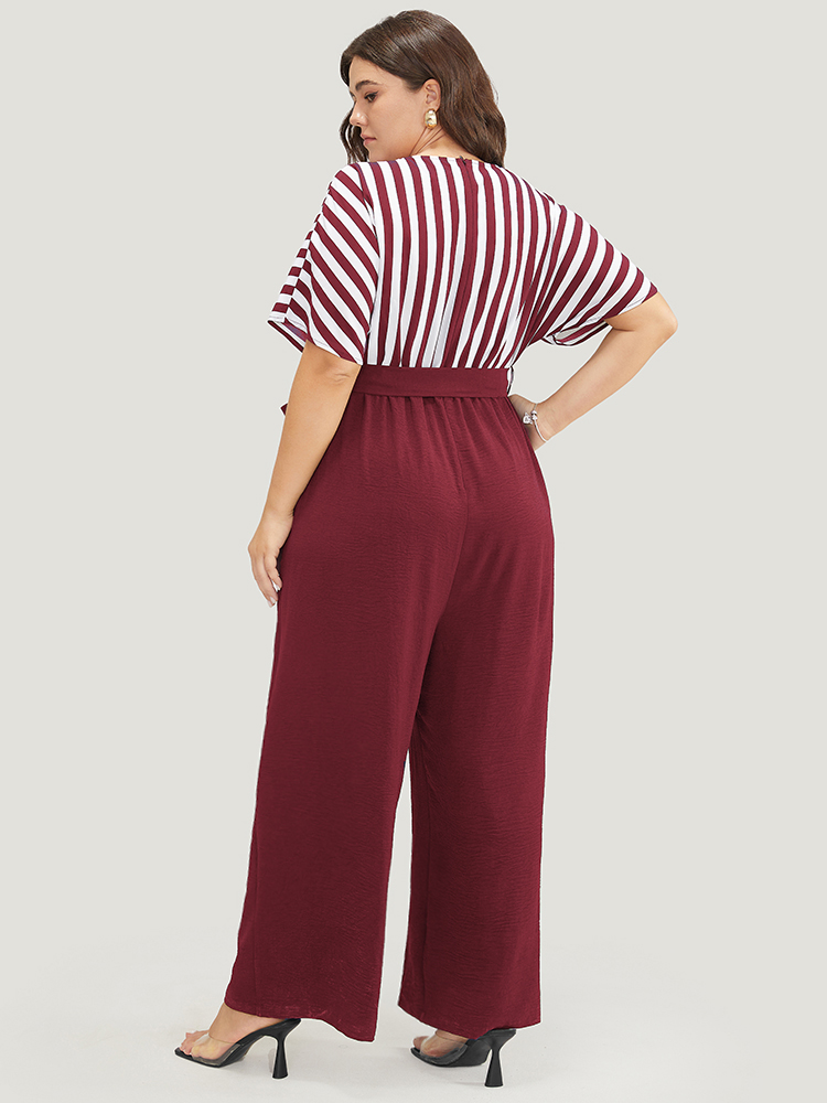 

Plus Size Scarlet Striped Patchwork Pocket Batwing Sleeve Belted Wrap Jumpsuit Women At the Office Short sleeve Overlap Collar Work Loose Jumpsuits BloomChic