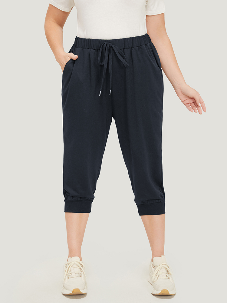 

Plus Size Solid Knot Front Pocket Carrot Pants Women Indigo Casual High Rise Dailywear Pants BloomChic