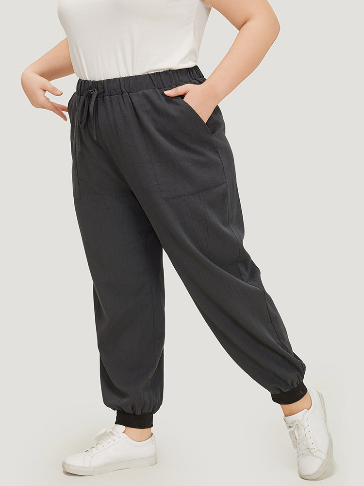 

Plus Size Plain Drawstring High Waist Pocket Carrot Pants Women Black Casual High Rise Dailywear Pants BloomChic