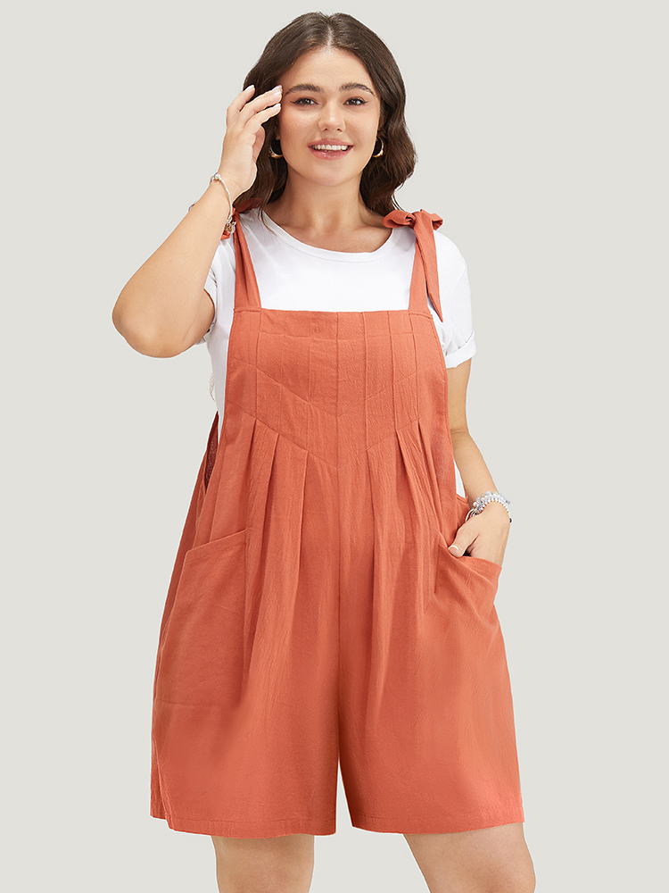 

Plus Size Rust Solid Pocket Bowknot Pleated Overall Romper Women Casual Sleeveless Spaghetti Strap Dailywear Loose Jumpsuits BloomChic