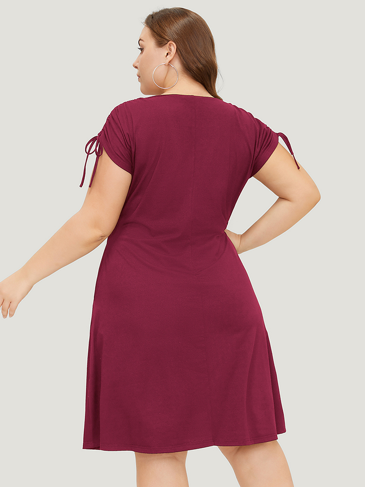 

Plus Size Solid Drawstring Sleeve Pocket Ruffle Zip Up Dress Scarlet Women Casual Zipper V-neck Half Sleeve Curvy Knee Dress BloomChic