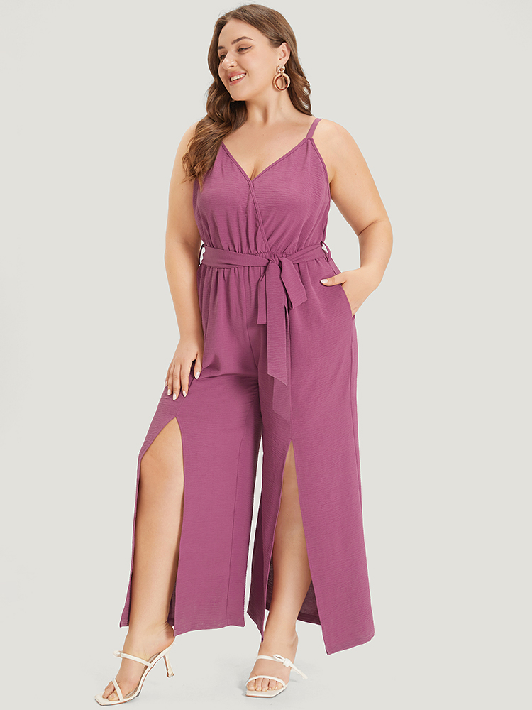 

Plus Size RedViolet Plain Split Front Pocket Surplice Neck Belted Jumpsuit Women Elegant Sleeveless V-neck Dailywear Loose Jumpsuits BloomChic