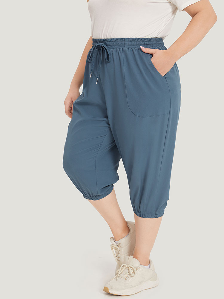 

Plus Size Solid Elastic Waist Drawstring Slant Pocket Cropped Pants Women Aegean Casual High Rise Dailywear Pants BloomChic