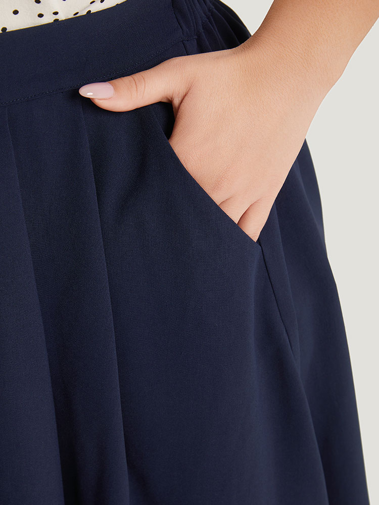 

Plus Size Solid Metal Detail Plicated Detail Knee Skirt Women Indigo Office Lined No stretch Pocket Work Skirts BloomChic