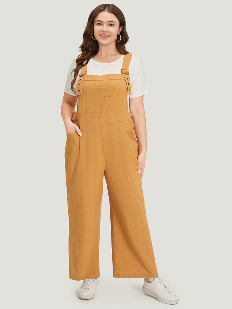 

Plus Size Bronze Solid Patched Pocket Overall Cami Jumpsuit Women Casual Sleeveless Spaghetti Strap Dailywear Loose Jumpsuits BloomChic