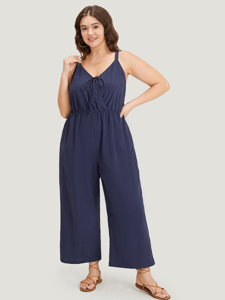 

Plus Size Indigo Plain Pocket Elastic Waist Ties Cami Jumpsuit Women Casual Sleeveless Spaghetti Strap Dailywear Loose Jumpsuits BloomChic