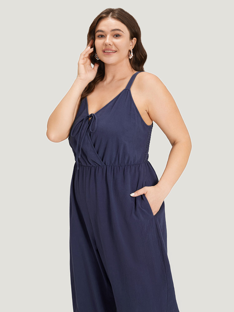 

Plus Size Indigo Plain Pocket Elastic Waist Ties Cami Jumpsuit Women Casual Sleeveless Spaghetti Strap Dailywear Loose Jumpsuits BloomChic