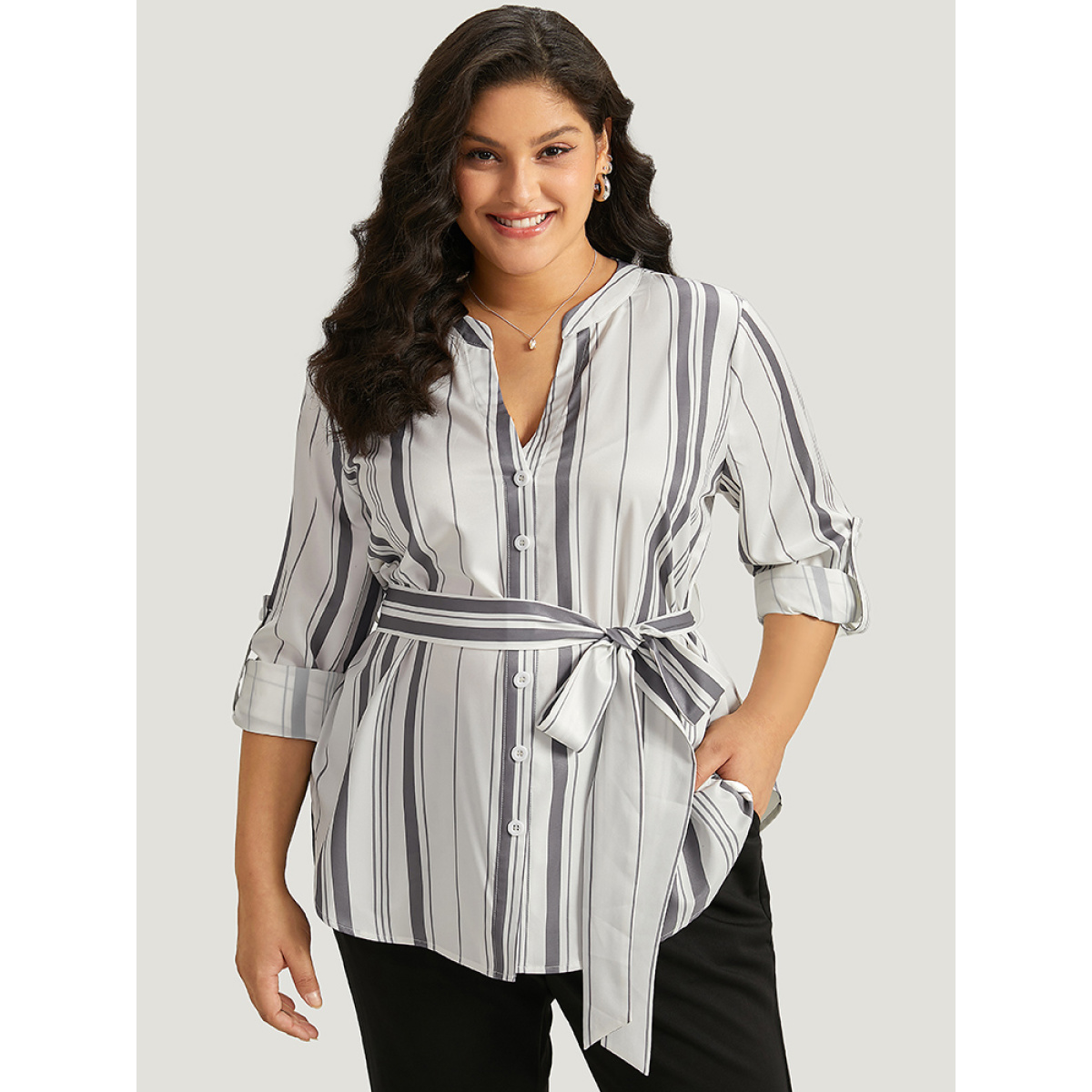 

Plus Size Ivory Striped Arc Hem Belted Roll Tab Sleeve Blouse Women Office Long Sleeve V-neck Work Blouses BloomChic