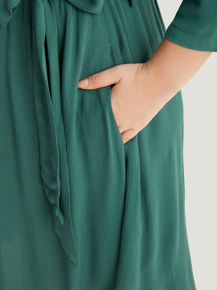 

Plus Size Solid Button Detail Pocket Belted Notched Dress Emerald Women Office Plain Notched collar Elbow-length sleeve Curvy Midi Dress BloomChic