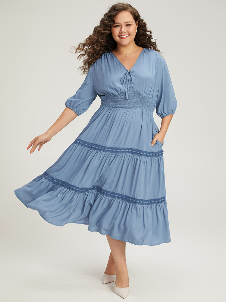 

Plus Size Solid Shirred Stitch Layered Hem Ties Dress Stone Women Elastic cuffs Tie Neck Half Sleeve Curvy Midi Dress BloomChic