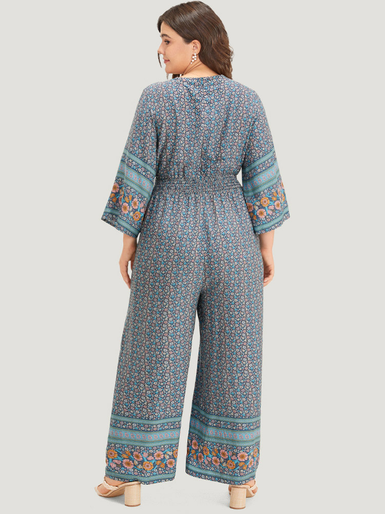 

Plus Size Blue Floral Print Shirred Overlap Collar Jumpsuit Women Resort Elbow-length sleeve V-neck Vacation Loose Jumpsuits BloomChic