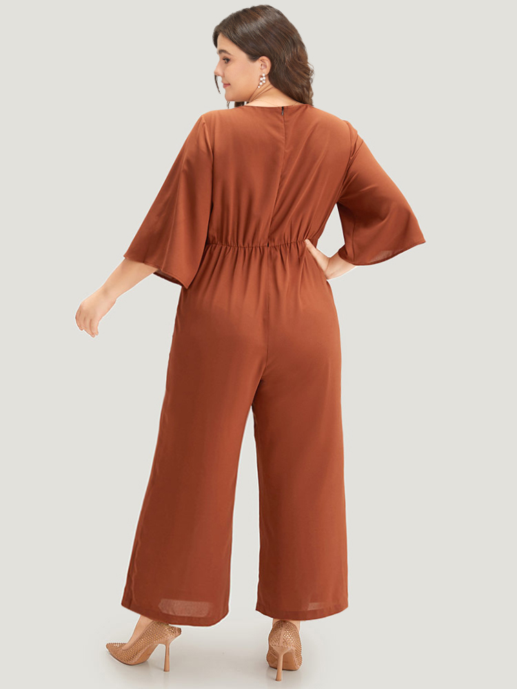 

Plus Size Brown Plain Crisscross Plicated Detail Flutter Sleeve Jumpsuit Women Elegant Elbow-length sleeve V-neck Dailywear Loose Jumpsuits BloomChic