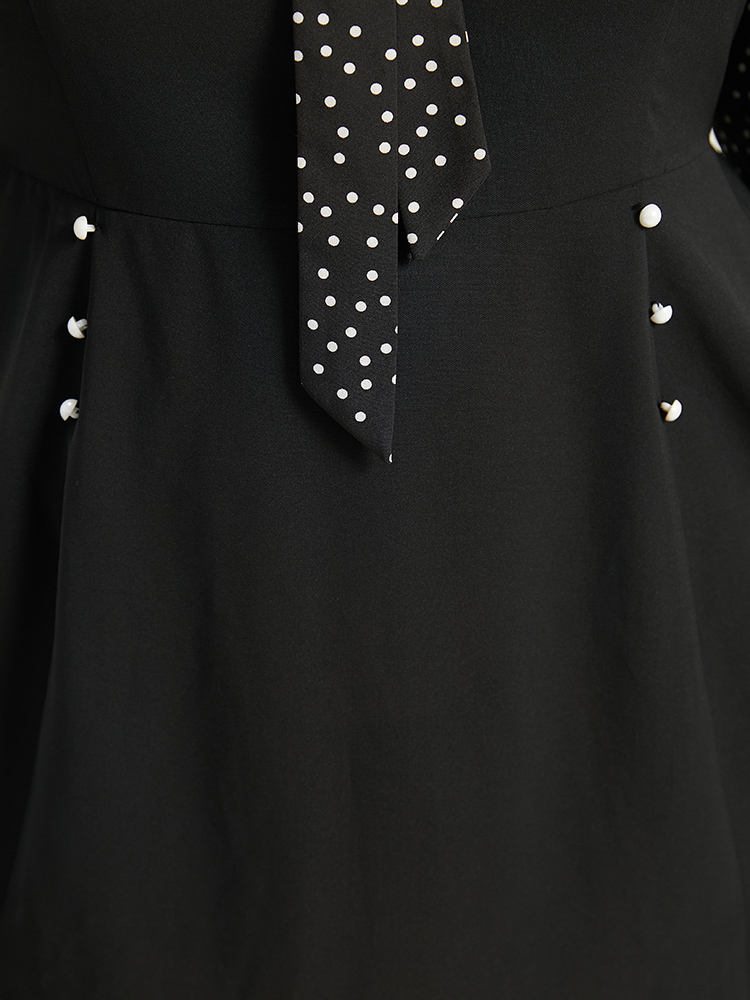 Plus Size Polka Dot Ties Pocket Button Detail Dress Black Women Office Elastic cuffs Tie Neck Long Sleeve Curvy Knee Dress BloomChic 26/4X 