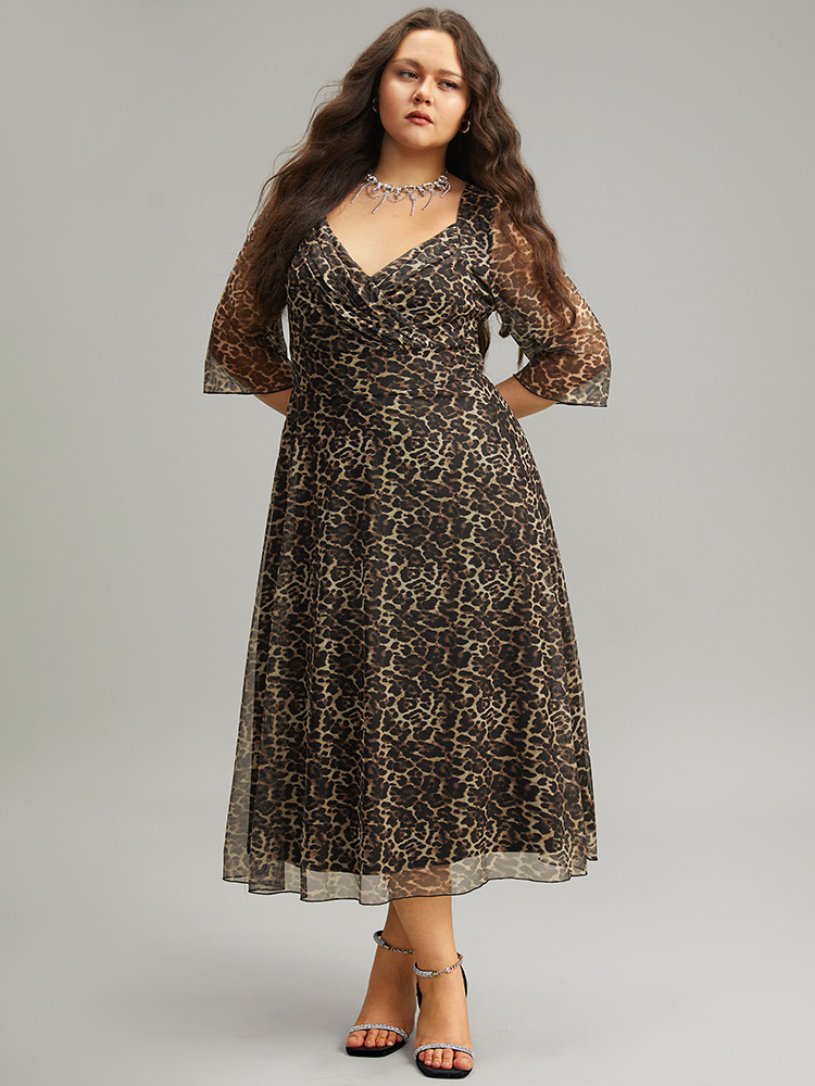 

Plus Size Leopard Print Mesh Patchwork V Neck Dress Leopard Women Glamour See through V-neck Elbow-length sleeve Curvy Midi Dress BloomChic