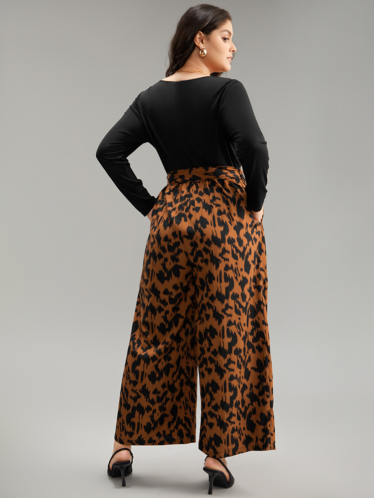 

Plus Size Rust Leopard Patchwork Pocket Belted Long Sleeve Jumpsuit Women Elegant Long Sleeve Round Neck Dailywear Loose Jumpsuits BloomChic