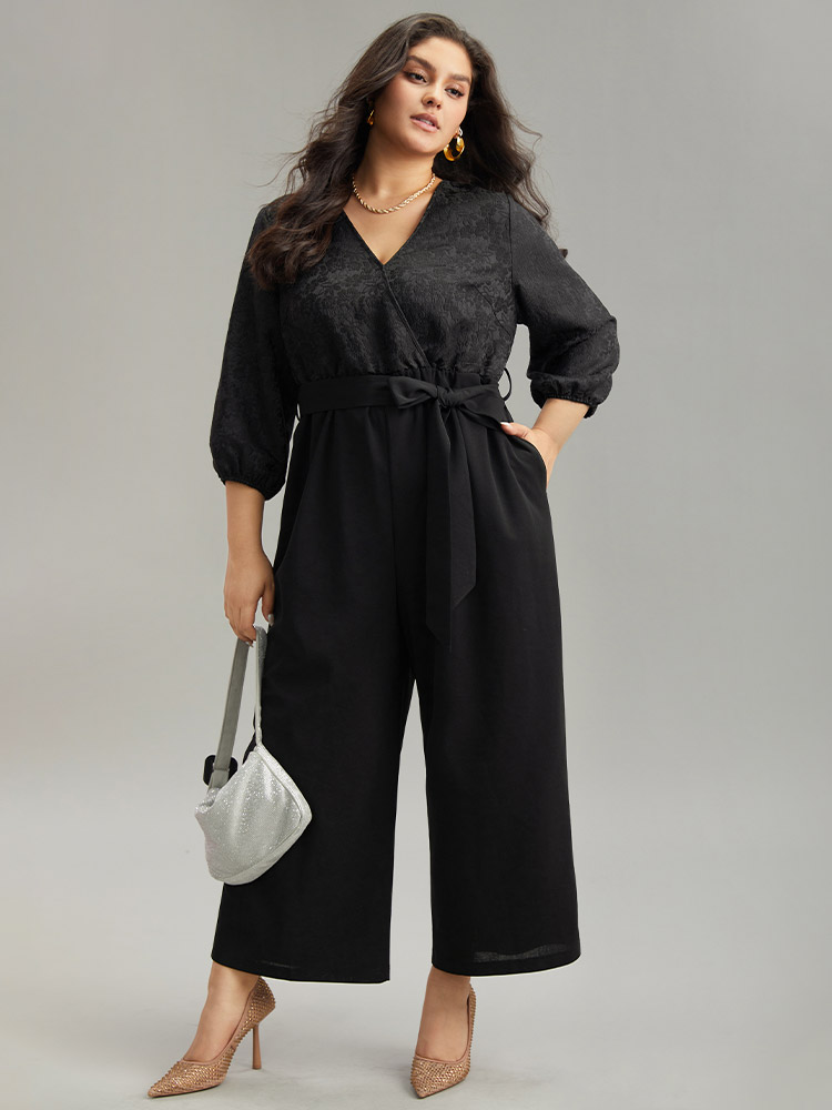 

Plus Size Black Plain Textured Belted Wrap Jumpsuit Women Party Elbow-length sleeve Overlap Collar Going out Loose Jumpsuits BloomChic