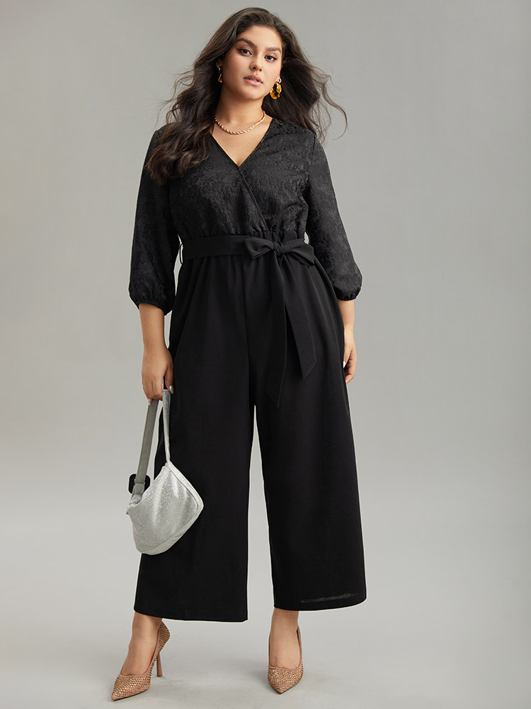 

Plus Size Black Plain Textured Belted Wrap Jumpsuit Women Party Elbow-length sleeve Overlap Collar Going out Loose Jumpsuits BloomChic