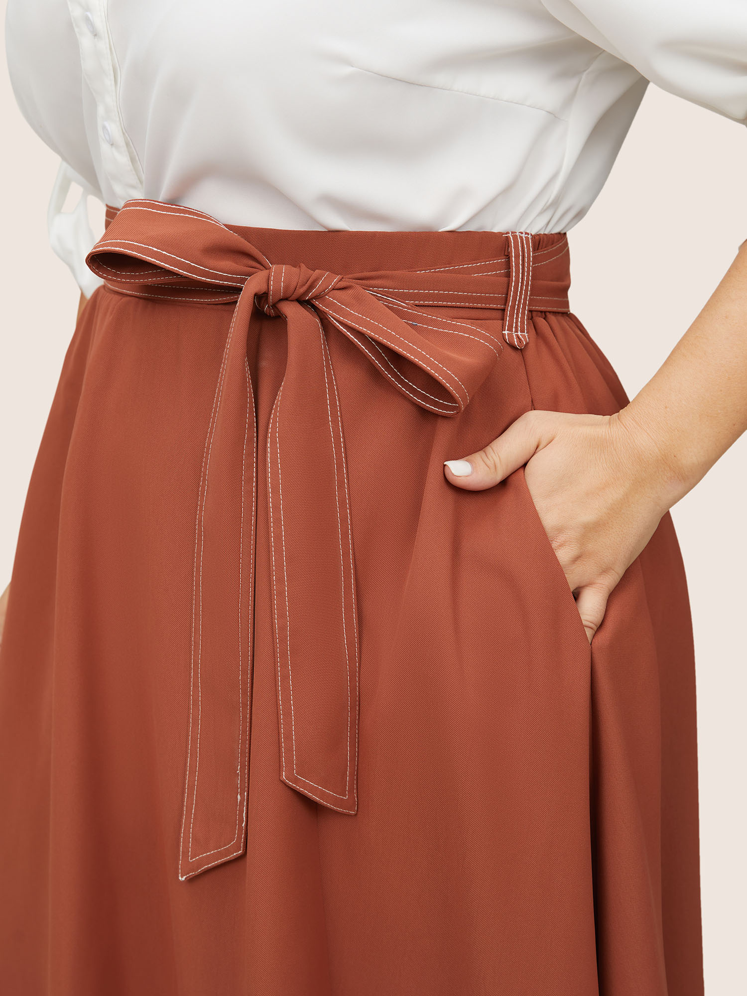 

Plus Size Contrast Trim Bowknot Belted Asymmetrical Hem Skirt Women Maroon At the Office Non No stretch Slanted pocket Belt Work Skirts BloomChic
