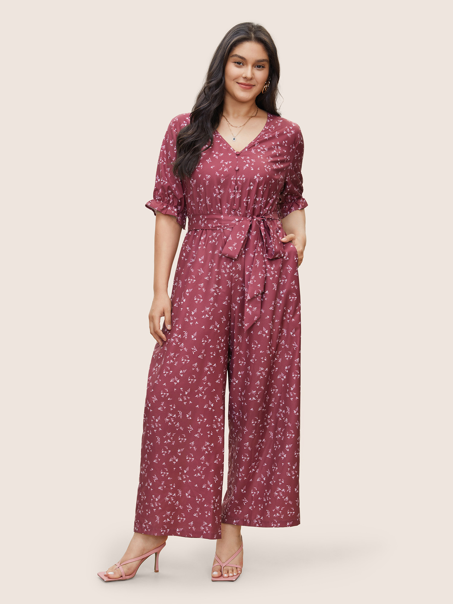 

Plus Size DustyPink Ditsy Floral Flutter Trim Belted Button Detail Jumpsuit Women Elegant Half Sleeve V-neck Everyday Loose Jumpsuits BloomChic