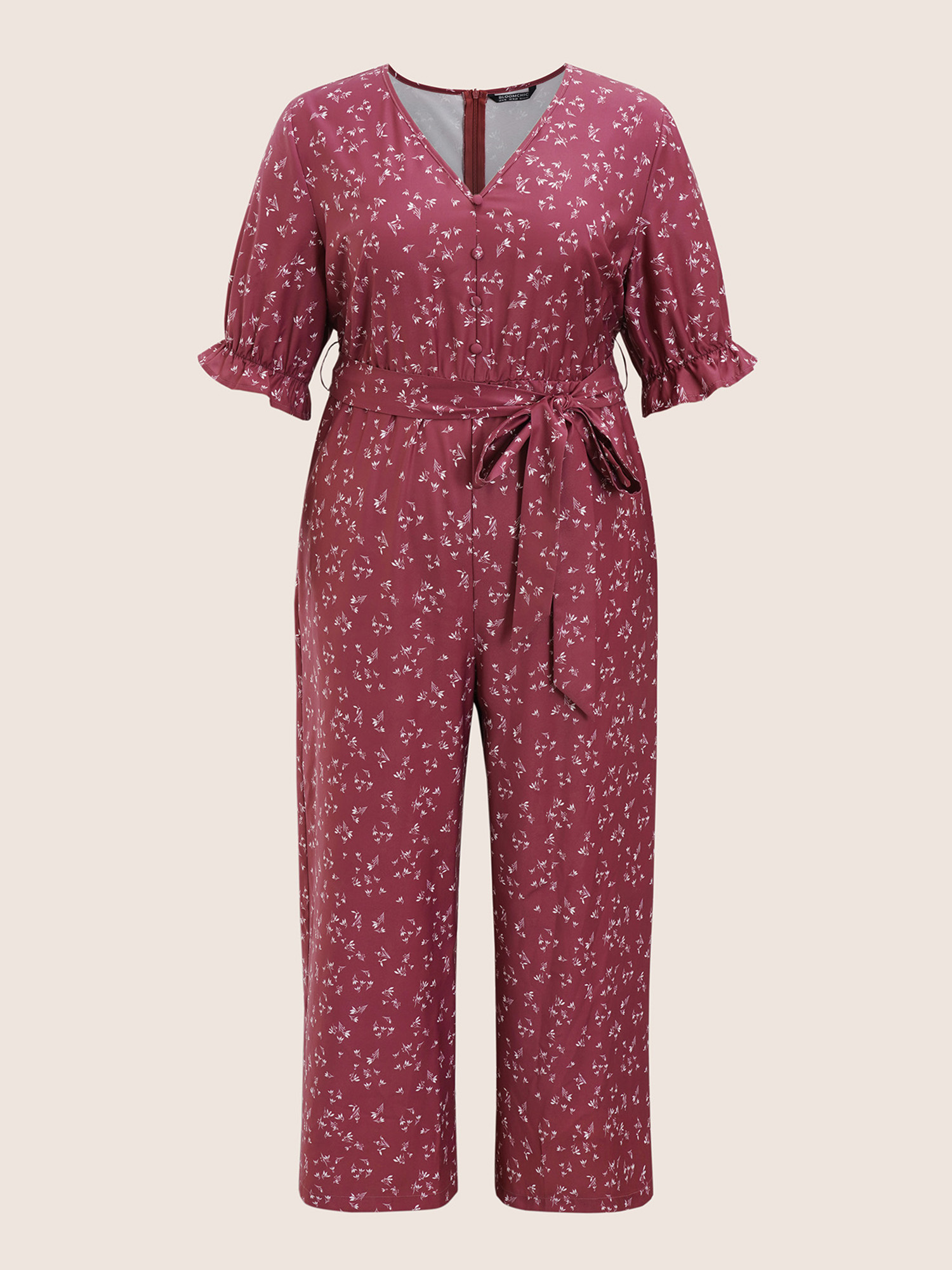 

Plus Size DustyPink Ditsy Floral Flutter Trim Belted Button Detail Jumpsuit Women Elegant Half Sleeve V-neck Everyday Loose Jumpsuits BloomChic