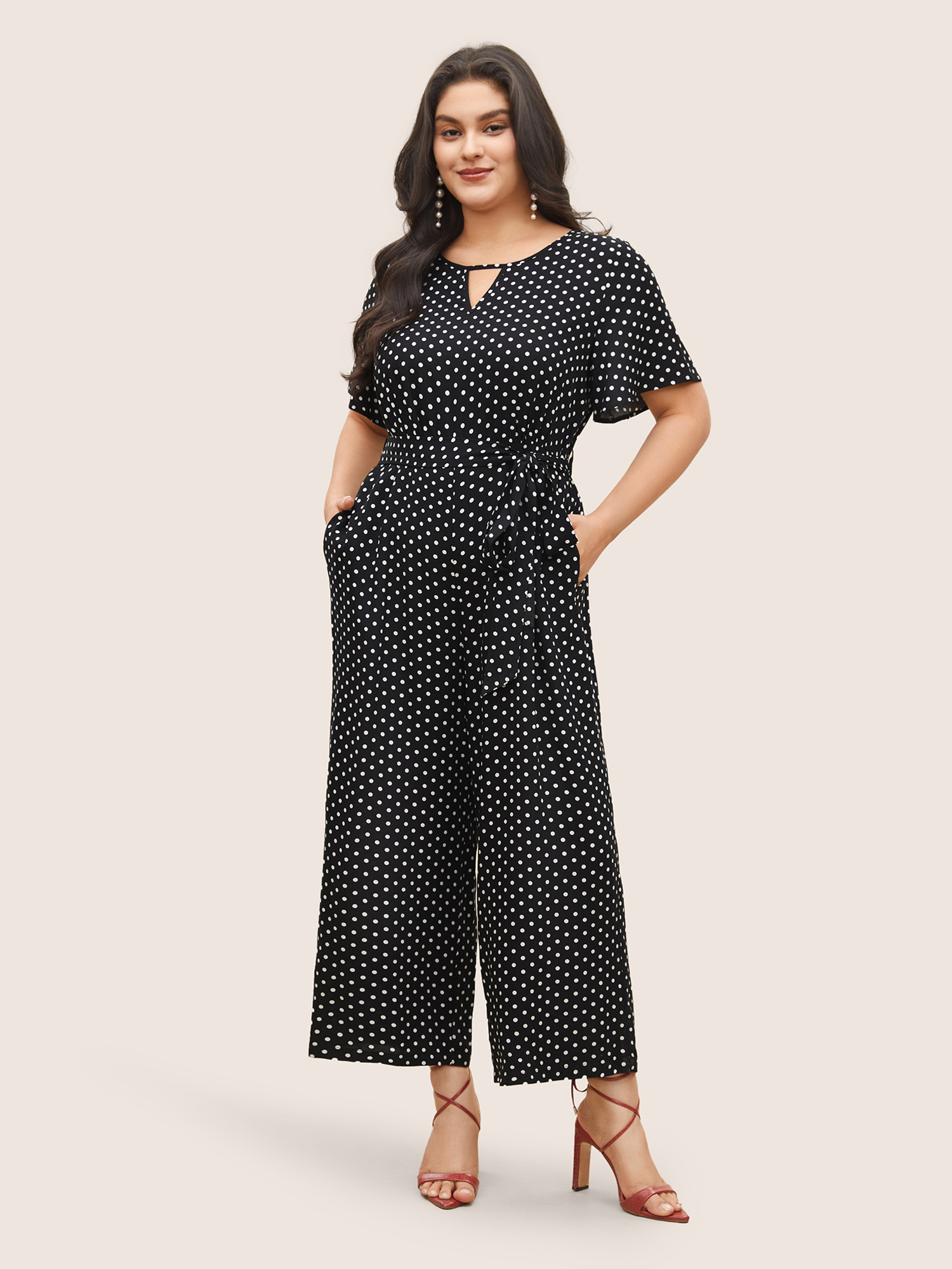 

Plus Size Black Polka Dot Cut Out Zipper Belted Jumpsuit Women Elegant Short sleeve Notched collar Everyday Loose Jumpsuits BloomChic