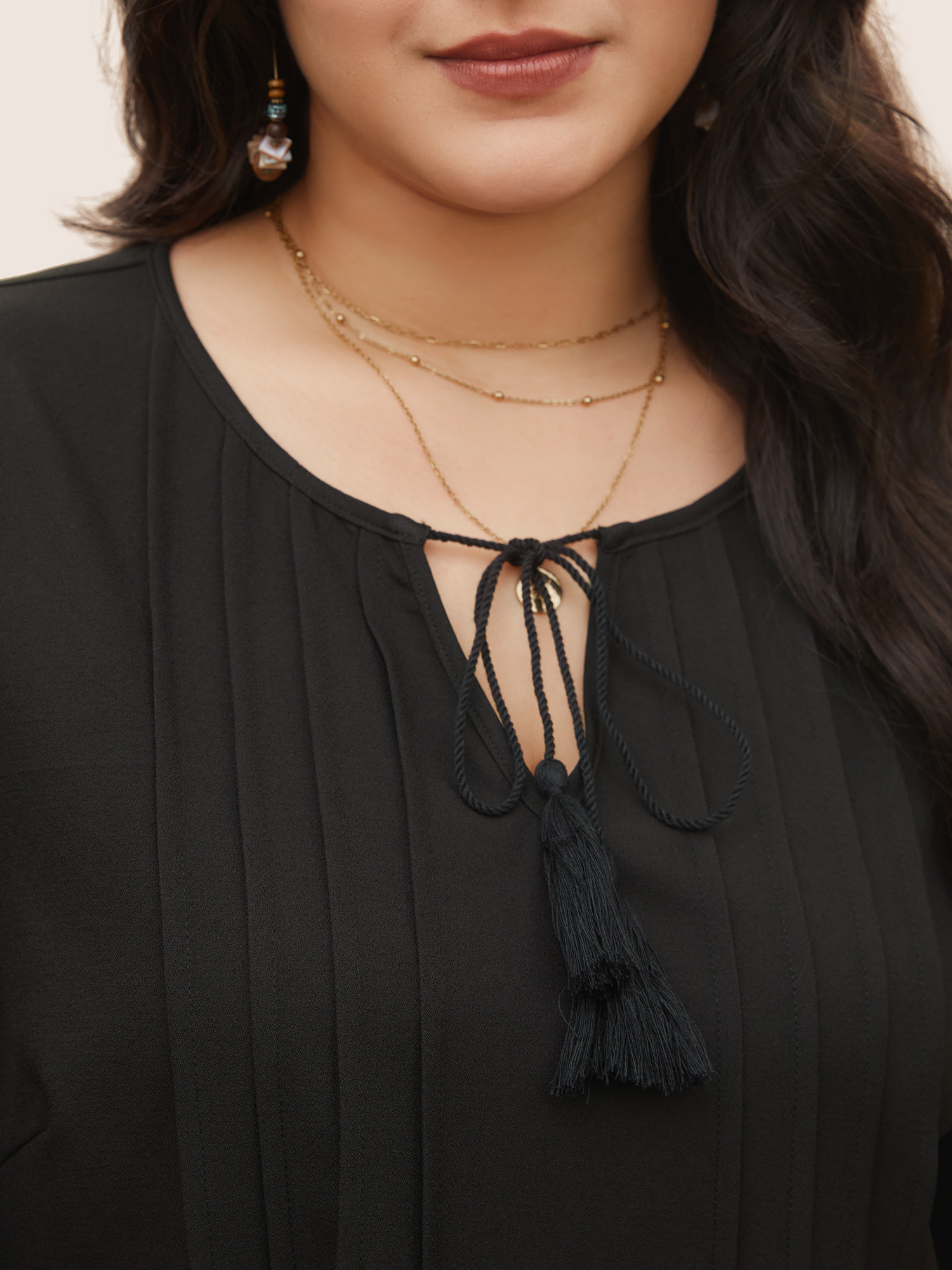 Plus Size Black Solid Laser Cut Pleated Tassel Trim Blouse Women Resort Half Sleeve V-neck Vacation Blouses BloomChic 18-20/2X 